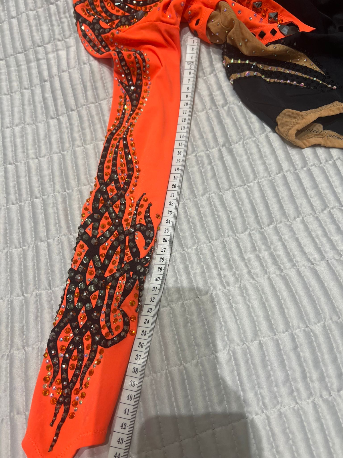 Black and orange leotard for gymnastics — photo 5