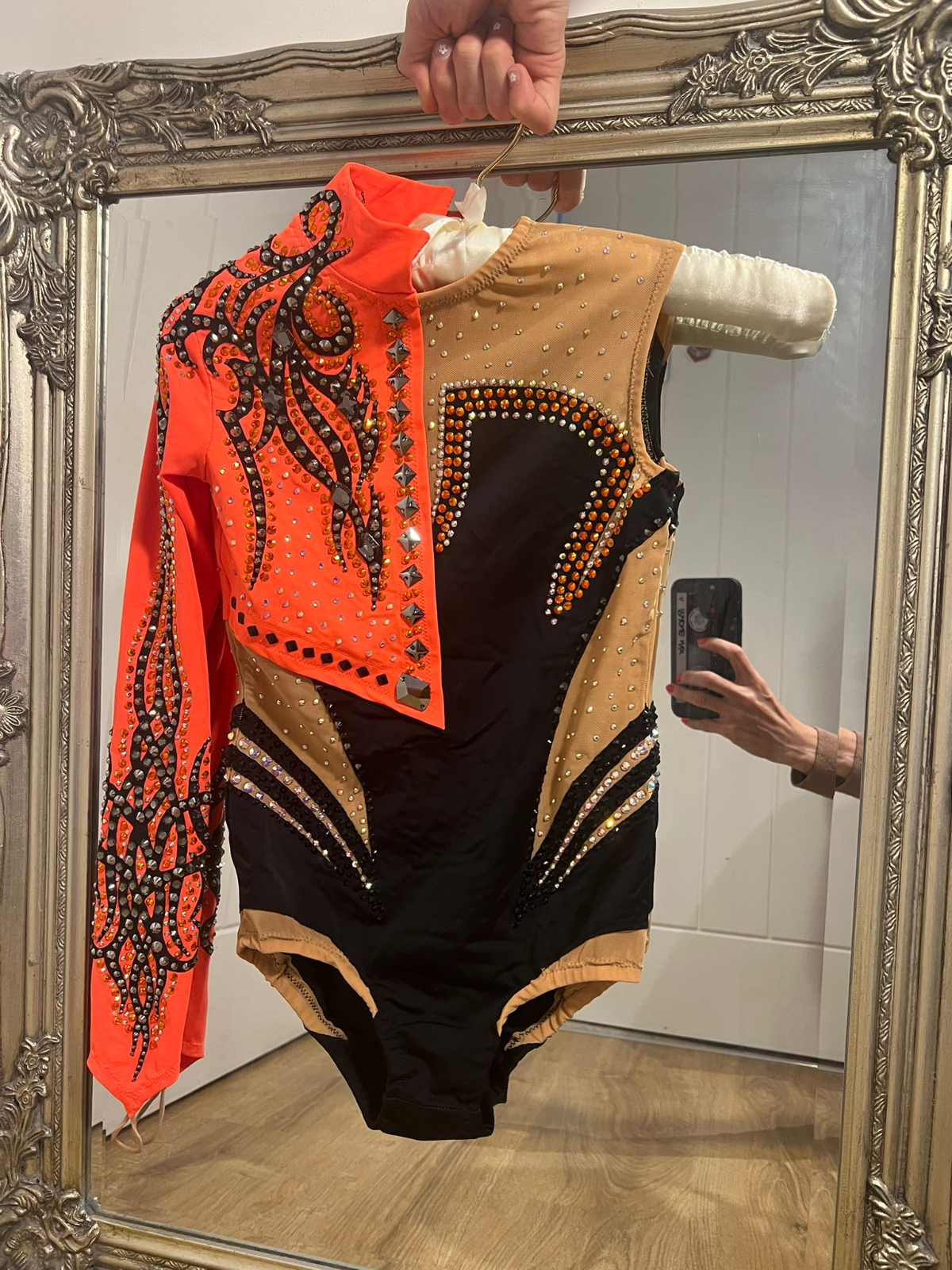 Black and orange leotard for gymnastics — photo 3